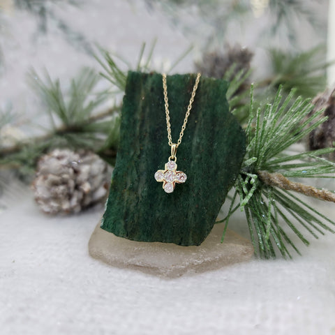 10k yellow gold pedant holds (4) four round brilliant cut lab diamonds with a combined carat weight of .38cttw. From the top of the bail to the bottom of the pendant, it is just shy of 13.00mm&nbsp; 10k gold 18" inch whisper chain with spring clasp