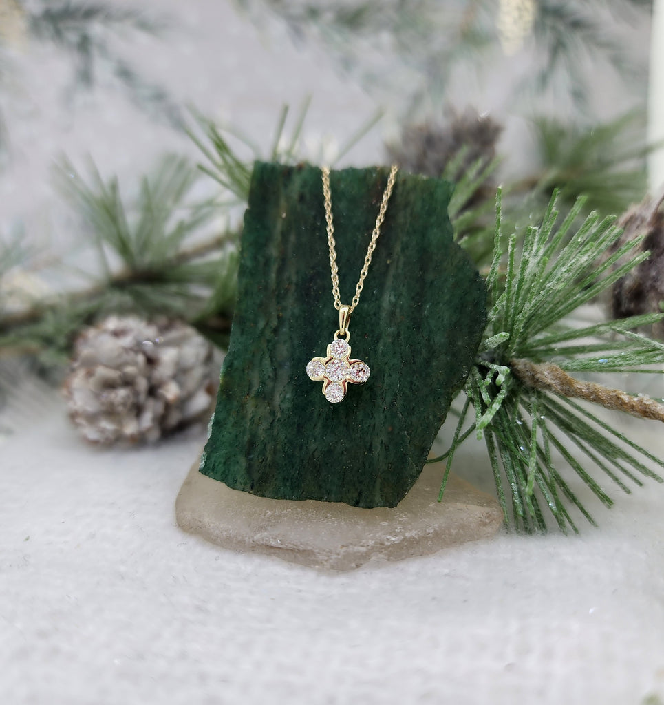 10k yellow gold pedant holds (4) four round brilliant cut lab diamonds with a combined carat weight of .38cttw. From the top of the bail to the bottom of the pendant, it is just shy of 13.00mm&nbsp; 10k gold 18" inch whisper chain with spring clasp