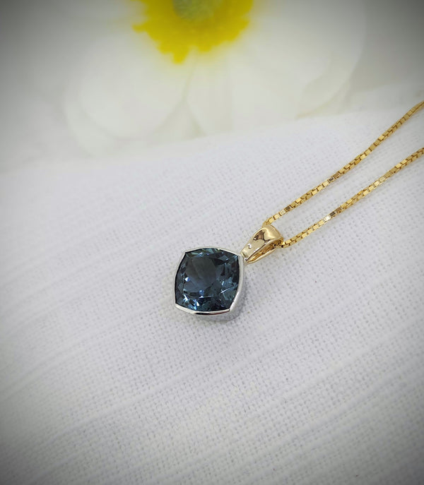 ✨ Fresh from Our Custom Shop! ✨

This stunning pendant is a true one-of-a-kind treasure. Featuring a vibrant 4.53 carat Blue Tourmaline, the gemstone is beautifully showcased in a 14k white gold bezel, accented with a 14k yellow gold bail for a timeless two-tone look. The rich blue hue catches the light from every angle, making this piece effortlessly elegant yet bold.

💎 Handcrafted in our custom shop
💎 Pendant only — chain sold separately
💎 A perfect statement piece or unforgettable gift

✨ $1,200.00 ✨