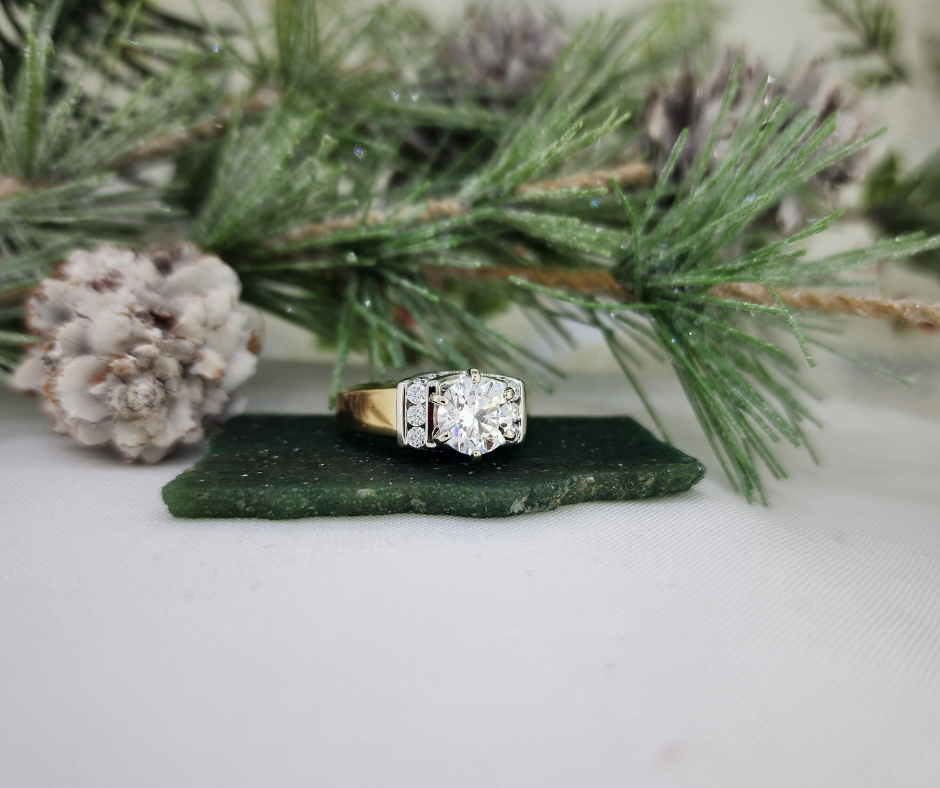 This fabulous ring is crafted from 14k gold and is set with .49cttw in natural round brilliant cut accent diamonds set in white gold. The center diamond is a 1.50ct round brilliant cut Lab grown diamond H color VS2 clarity. No lab report. This ring is very well constructed, heavy, weighing in at 10.0 grams (including the diamonds) . The ring measures 9.00mm at the top and tapers to a 2.45mm shank