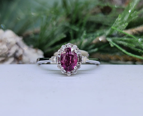 14k white gold holds a beautiful natural ruby accented by .20cttw in natural mined diamonds. Classic and stunning!

Metal:&nbsp;14K Gold
Metal Color:&nbsp;White Gold
Diamond TCW: .20 TCW (total carat weight)
Ruby Size:&nbsp;6x4mm
Ring Width by halo:&nbsp;6.00&nbsp;mm