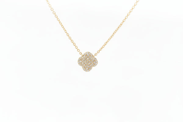Constructed of 14k yellow gold, this fabulous clover pendant is pave set with .16cttw in round brilliant cut natural diamonds! A very lively piece, this pendant shimmers and sparkles! Attached to a 16 inch 14k yellow gold nice cable chain with a lobster claw