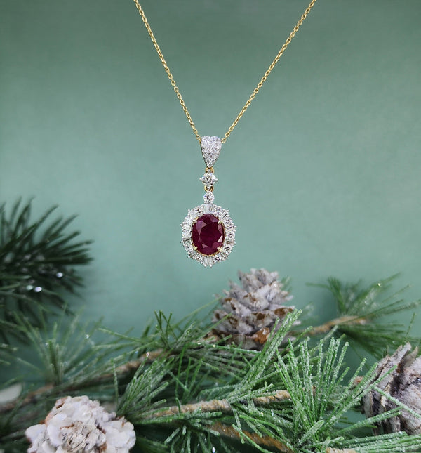 Gracefully crafted in 14k yellow gold, this exquisite pendant features a captivating 2.25 carat natural oval cut ruby. The ruby is surrounded by a halo of natural mined diamonds in a combination of round and baguette cuts, adding shimmer and brilliance.
Metal Color: 14k Yellow Gold
Diamond TCW: .25ctw TCW (total carat weight)
Ruby TCW: 2.25 TCW (total carat weight)
Necklace Length:18 inches
Necklace Height: 27.00 mm (including the bail)
Necklace Width: 10.00mm