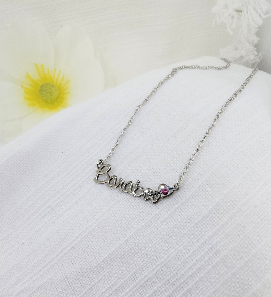 Celebrate your hometown in timeless style with our Baraboo Name Necklace. This elegant script necklace is crafted in sterling silver. The necklace is suspended from an adjustable chain that can be worn at 17 or 18 inches, making it ideal for everyday wear or layering with your favorite pieces.
A meaningful keepsake and a beautiful way to show local pride.
Details:
Metal: Sterling Silver
Chain Length: Adjustable 16 or 18 inches
Style: Script Name Necklace
Also Available: Sterling Silver with 14k 