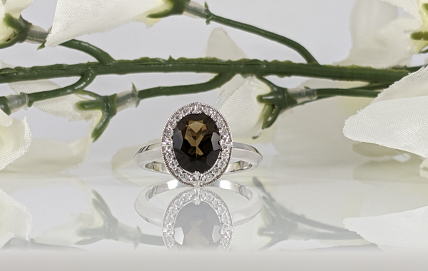 14k white gold and diamond smokey quartz ring with 9x7mm quarts and .15cttw in diamonds