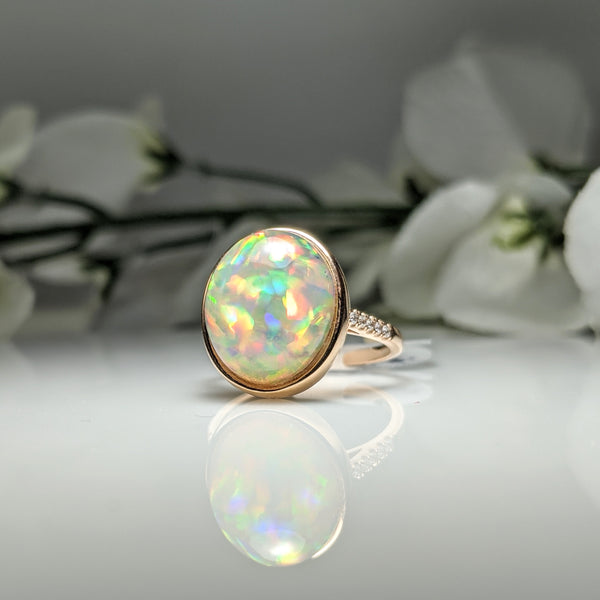 14k rose gold Ethiopian Opal and Diamond ring