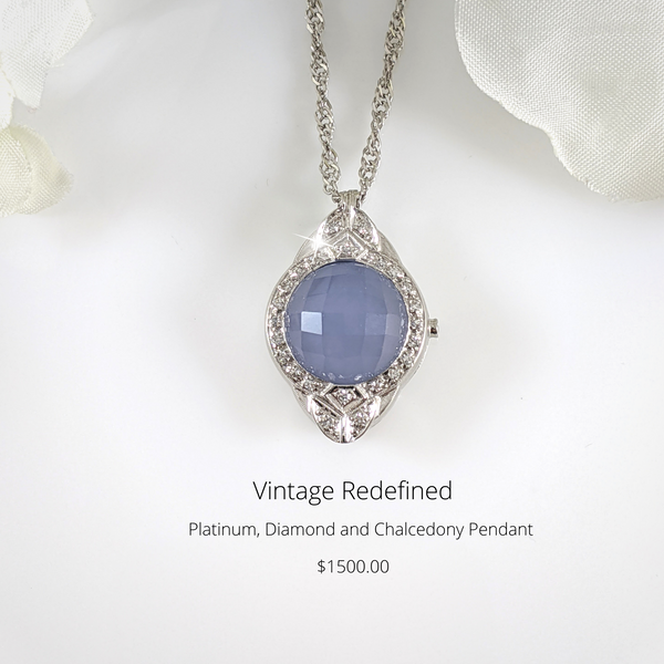 This lovely piece was a wristwatch heading to the scrap bin but we saved it! The movement of the watch couldn't be fixed so we converted the watch case to this fabulous pendant!  Constructed of platinum and set with .25cttw in diamonds, the center stone is a blue Chalcedony. Pendant is hung on an 18 inch platinum chain. One of a kind!  $1500.00